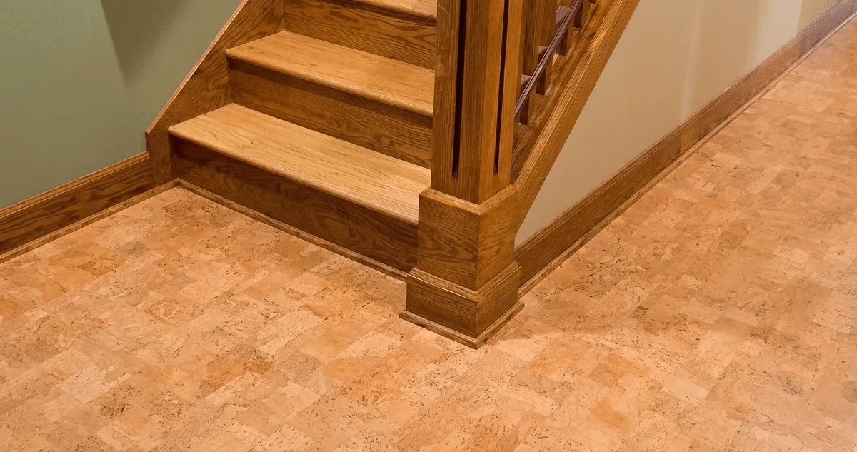 End of a staircase with cork flooring in St Paul, MN
